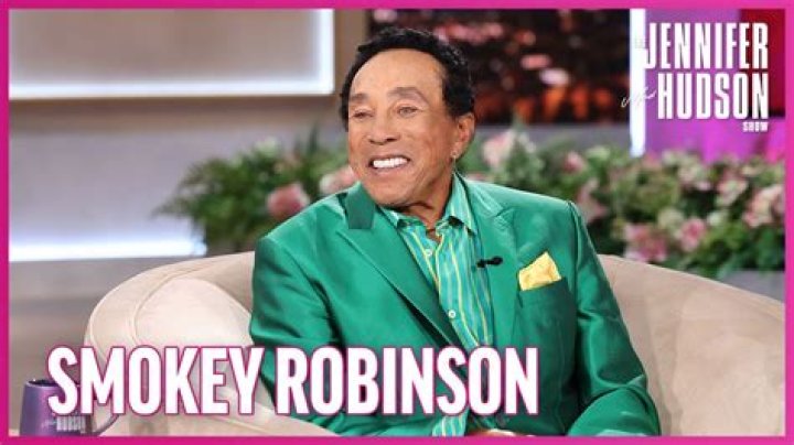 Did Smokey Robinson lose his parents at an early age?