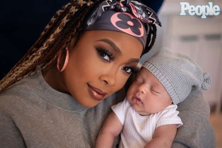 Does Da Brat and Lisa Ray have the same parents?