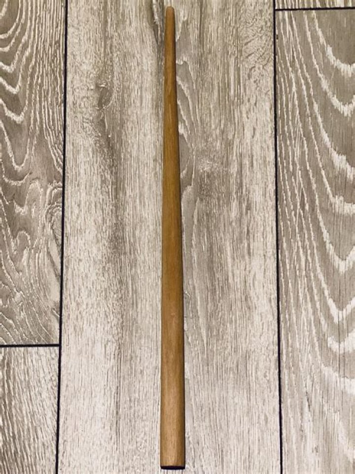 Who has an elm wood wand?