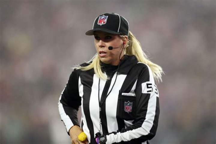 Who is the female official in the Iowa Nebraska game?
