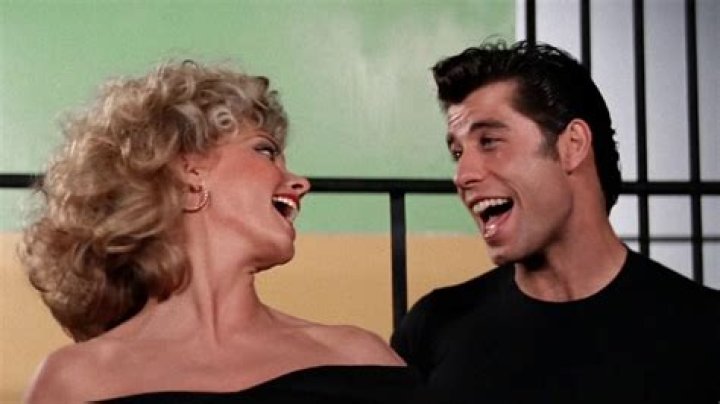 Why did John Travolta play a woman in Hairspray?